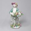 A Derby Figure of a Flower Seller
