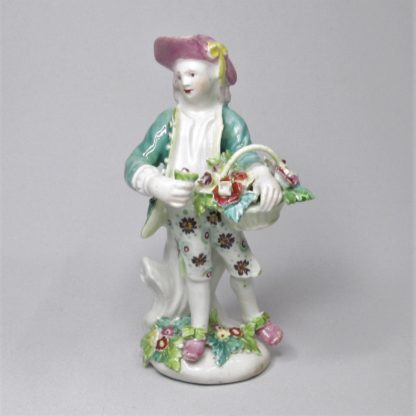 A Derby Figure of a Flower Seller