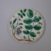 An early Worcester porcelain Blind Earl pattern dish with moulded rose buds and leaves,  decorated  in bright coloured enamels surrounded with floral sprays Circa 1770