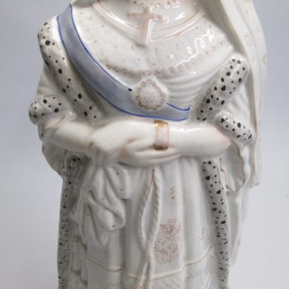 A Large Staffordshire figure of Queen Victoria, white and gilt version, wearing an ermine edge cloak.  Circa 1840 - Image 7