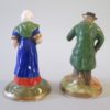 A pair of miniature Staffordshire figures of an old man and woman. Circa 1880. - Image 3