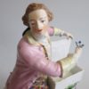 A Derby figure of a man with a basket and his dog at his feet - Image 7