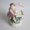A Derby figure of a man with a basket and his dog at his feet - Image 2