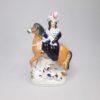 A Staffordshire figure of probably Queen Victoria on a horse with her dog at the horse's feet, possibly Dash.  Circa 1850