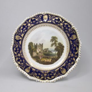 Bloor Derby Porcelain plate decorated with a blue and gilt border with a scene titled Bywell Castle,  Circa 1820.