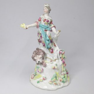 A Rare Derby Figure of the Goddess Ceres, she is modelled wearing a castellated crown standing on a mound dressed in a long floral decorated robe,  Circa 1755-56