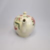 A small Creamware teapot and cover made at Cockpit Hill pottery works, Derby with hand decorated rose, leaves, cherries and other flowers. . Circa. 1765. - Image 4