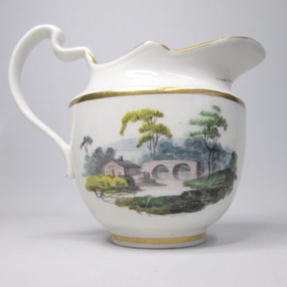 A Pinxton Cream Jug ,painted on each side with landscapes pattern 218 in gold probably by John Cutt Circa 1796-1813 - Image 3