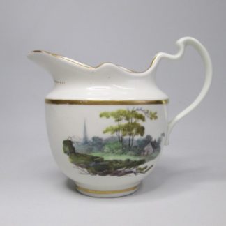 A Pinxton Cream Jug ,painted on each side with landscapes pattern 218 in gold probably by John Cutt Circa 1796-1813