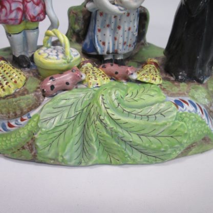 A Staffordshire pearlware 'Tythe Pig' group, depicting the farmer, holding a pig with other produce of bushels of corn and his wife holding a baby.   Circa 1820 - Image 11