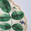 An eighteenth century Worcester porcelain Blind Earl dish, with raised moulding rose buds and leaves and a scalloped edge rim finished with a continuous gilt line. Circa: 1770. - Image 4