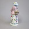 A Bow Porcelain Figure of a Lady Standing with a basket of flowers over her right arm and is representing the season of spring.  Circa 1760 - Image 4