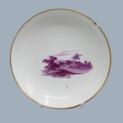 A Pinxton porcelain tea bowl and saucer, decorated in  puce with rural landscapes, attributed to William Billingsley. Circa 1796 to 1813 - Image 3