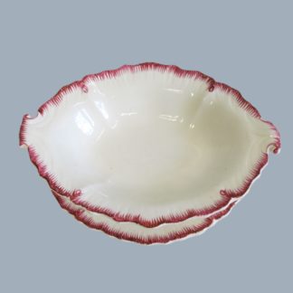 A probably Neale & Co of Staffordshire English Pottery Creamware oval shell-edged dish and stand decorated with a hand painted pink feather edge.  Circa 1785-1800.