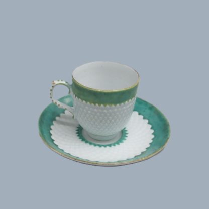 A Bow Porcelain Coffee cup and saucer with pinecone moulding and rare  anchor and dagger mark hand painted in red.   Circa: 1765-70 - Image 2