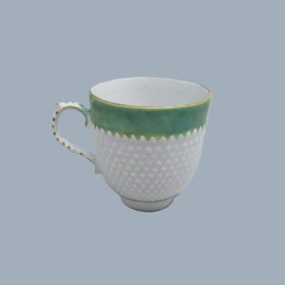 A Bow Porcelain Coffee cup and saucer with pinecone moulding and rare  anchor and dagger mark hand painted in red.   Circa: 1765-70 - Image 3