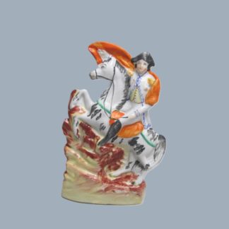 A Victorian Staffordshire equestrian figure of Napoleon on his horse Marengo. Circa 1850