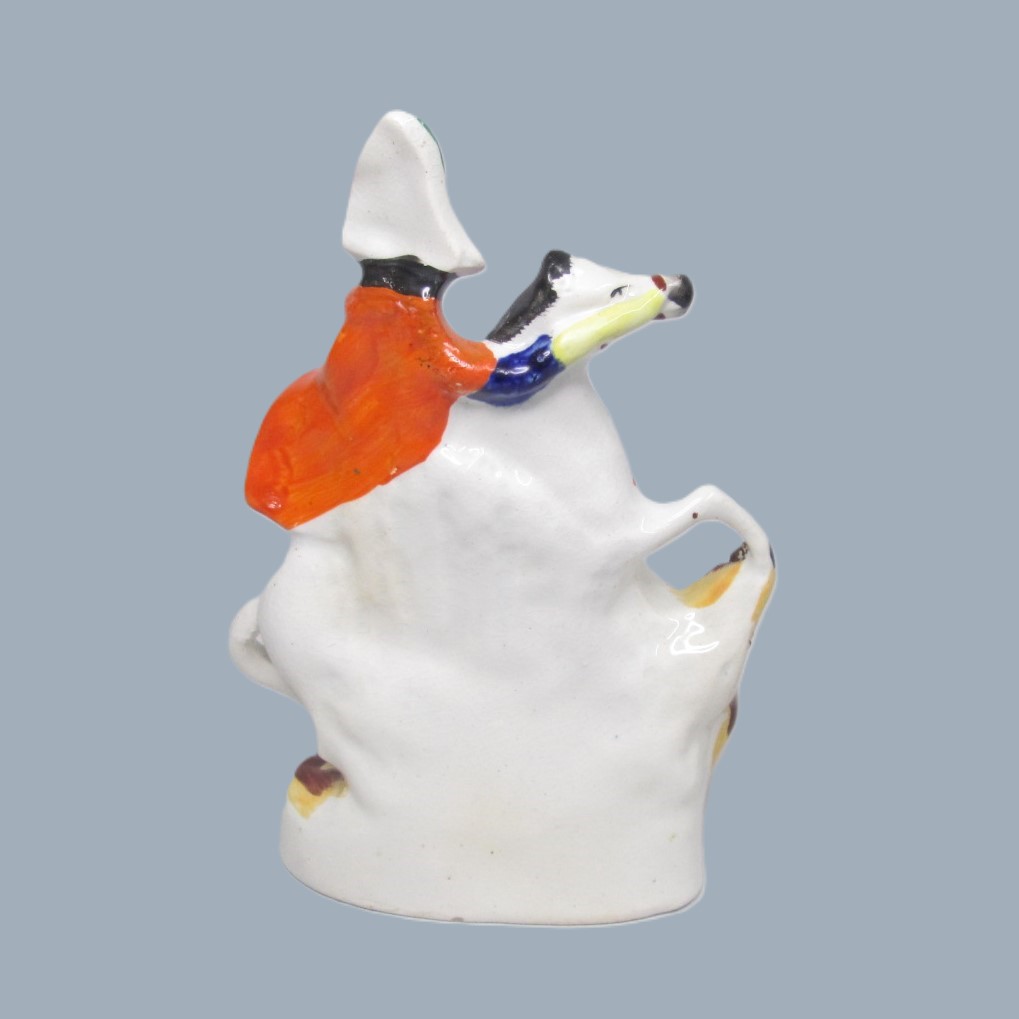 A Victorian Staffordshire military equestrian figure of a soldier with a sword and a canon and canon balls at his feet. Circa 1860. - Image 13