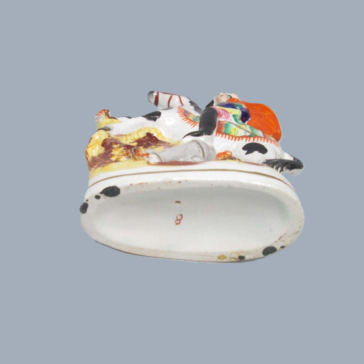 A Victorian Staffordshire military equestrian figure of a soldier with a sword and a canon and canon balls at his feet. Circa 1860. - Image 6