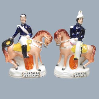 Two Victorian Staffordshire equestrian figures of Marshall Arnaud and Lord Raglan both well coloured  and painted by the same decorator. Circa 1855.