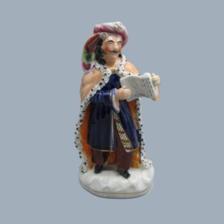 A Staffordshire portrait figure of Mr Barton in the role of Giaffier standing holding a scroll. Circa 1847