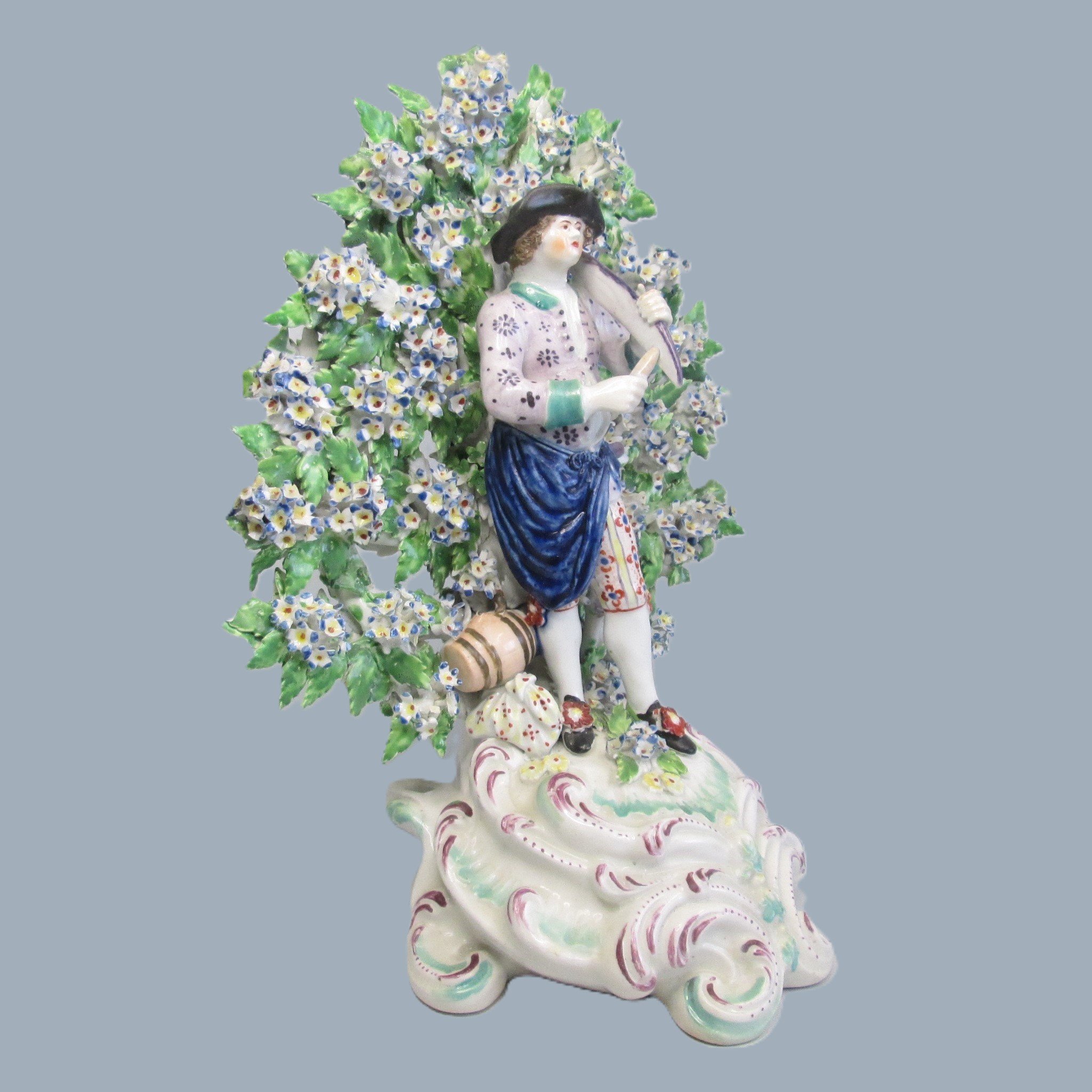 A Derby figure of a Harvester stood before bocage, sharpening his sythe with a whetstone. Circa 1768 - Image 2