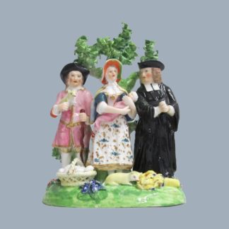 A Derby Tithe Pig Group, representing the Farmer's wife, offering her baby to the Clergyman as payment of the tithe, instead of the pig. Circa 1790
