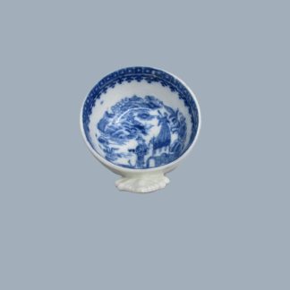 A  Caughley blue and white wine taster printed with the Fisherman pattern. Circa 1785
