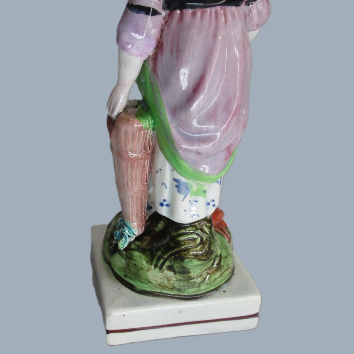 A Staffordshire pearlware square based pottery figure of a Lady holding fish in her apron, emblematic of the element 'Water'. Circa; 1800 - Image 14