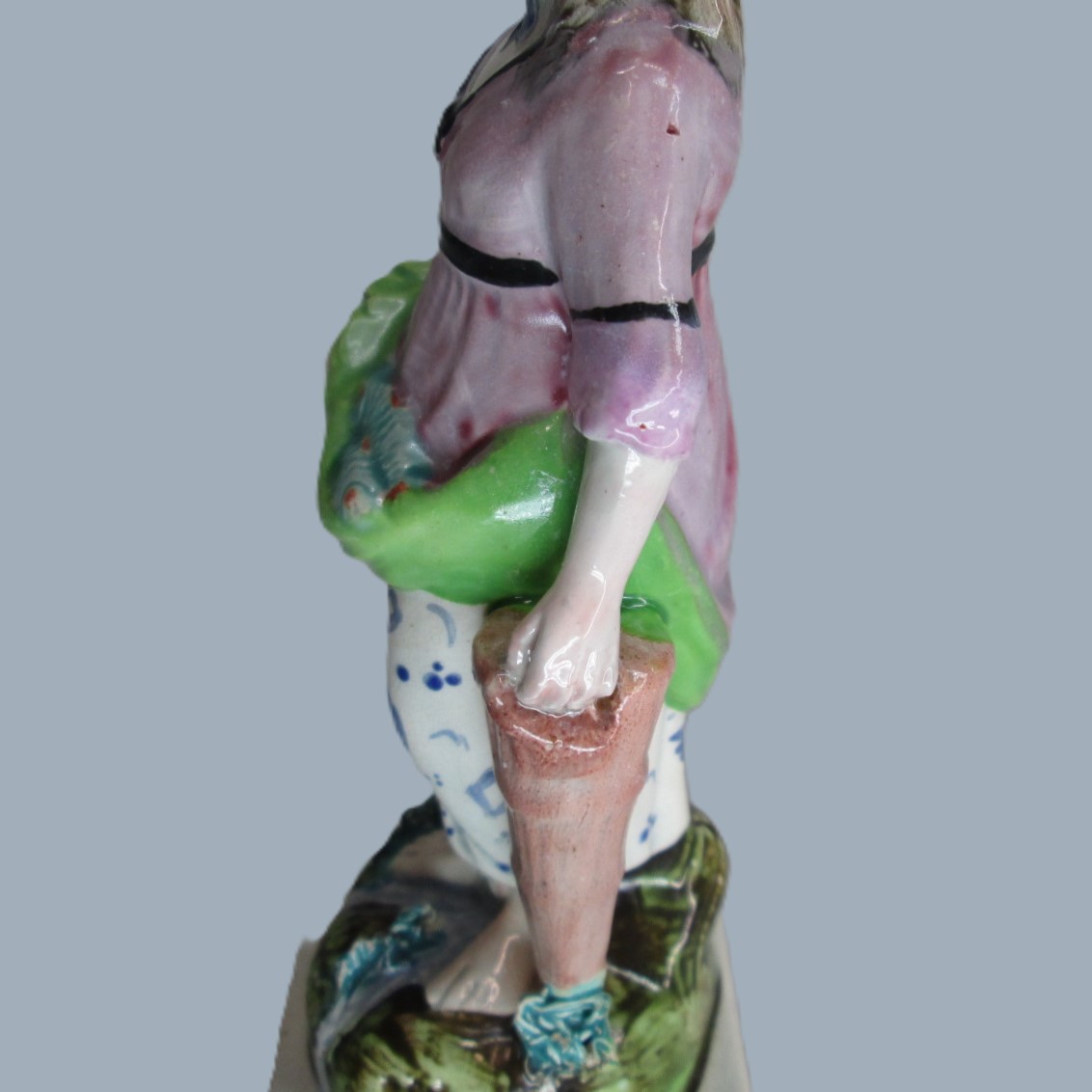 A Staffordshire pearlware square based pottery figure of a Lady holding fish in her apron, emblematic of the element 'Water'. Circa; 1800 - Image 4