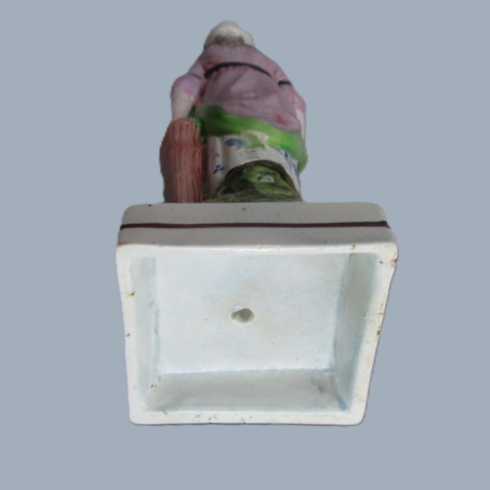 A Staffordshire pearlware square based pottery figure of a Lady holding fish in her apron, emblematic of the element 'Water'. Circa; 1800 - Image 9